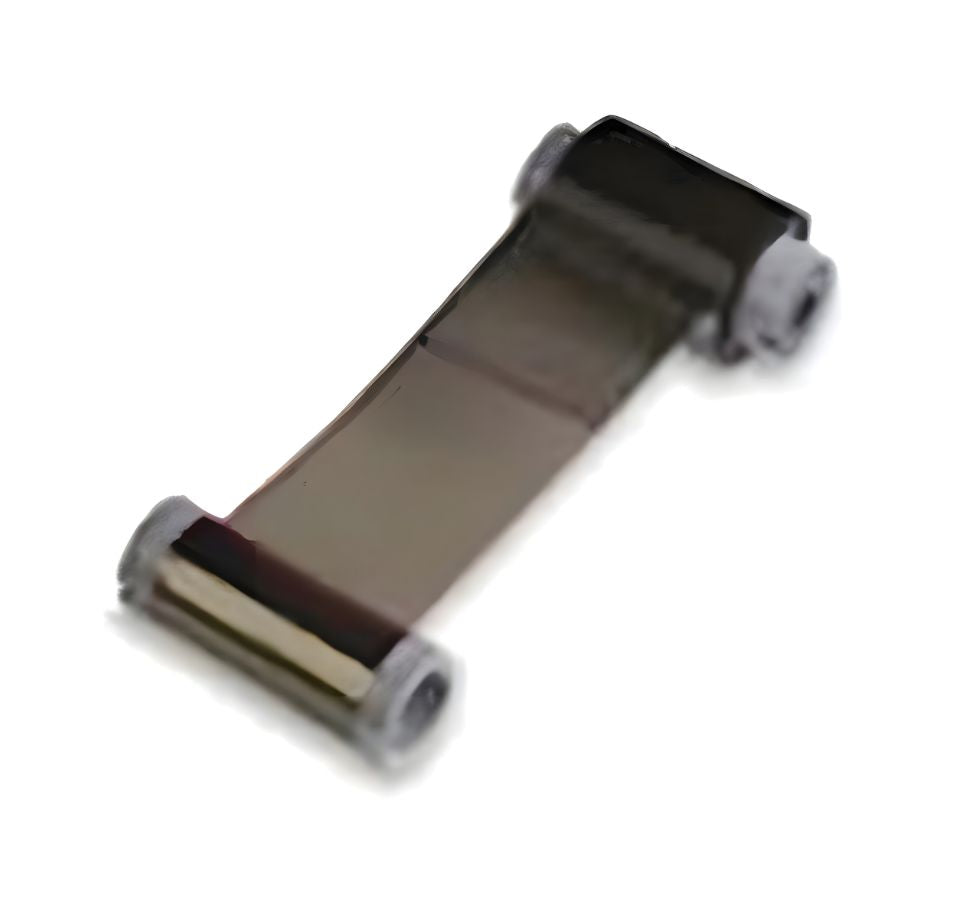 Roll of ribbon with two metal rollers on a white background - Zebra ZC10L Monochrome Black Ribbon 800010-101 | 2,000 Prints Card Printer Ribbon UAE
